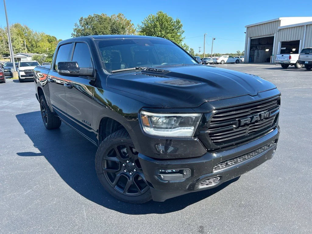 Used 2023 Diamond Black Ram Laramie image 1
