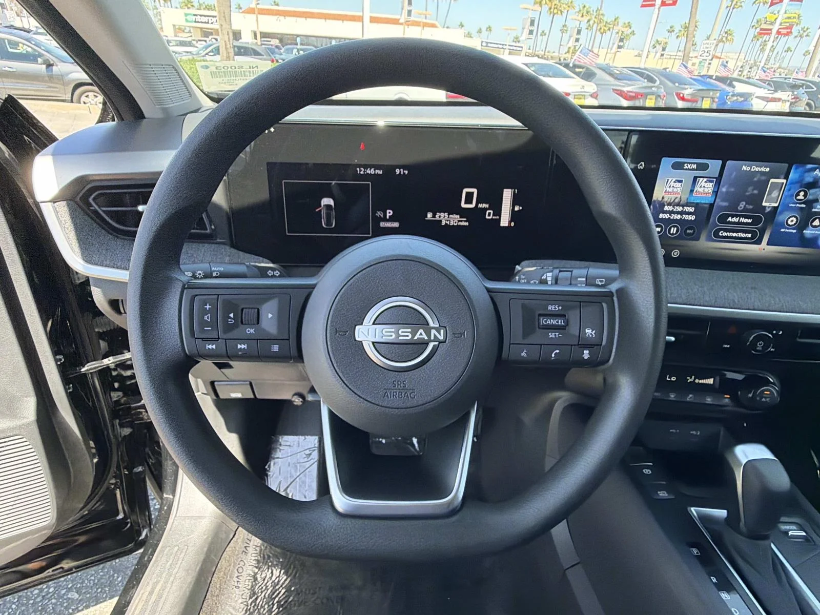 Used 2026 SUPER BLACK Nissan SV image 10