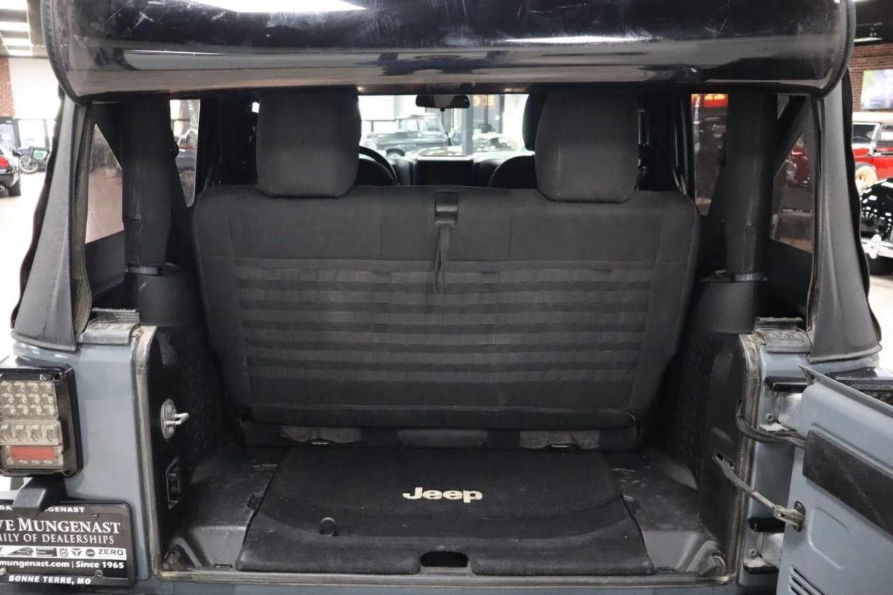 Used 2015 Hydro Blue Pearl Coat Jeep Sport image 12