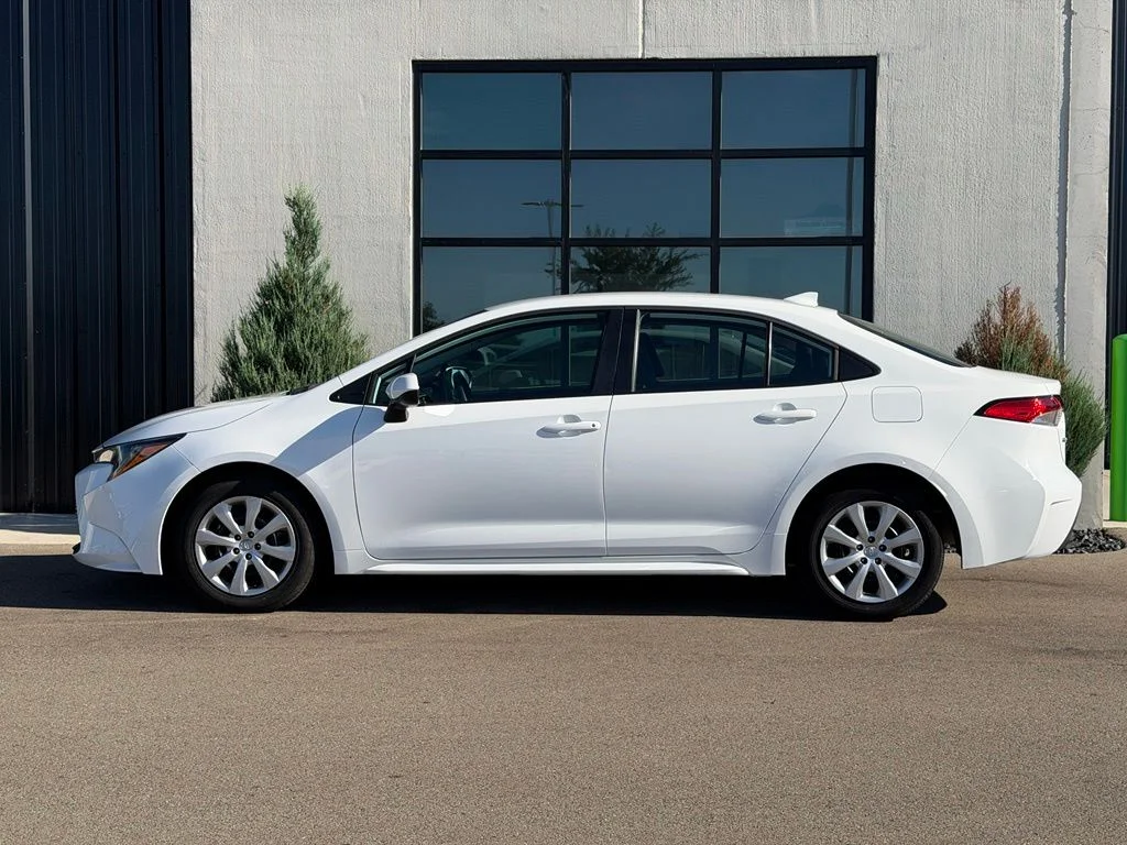 Used 2025 White Toyota LE image 2