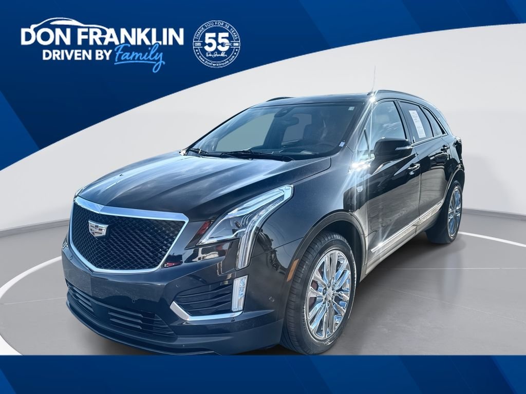 Used 2023 Black Cadillac Sport image 1