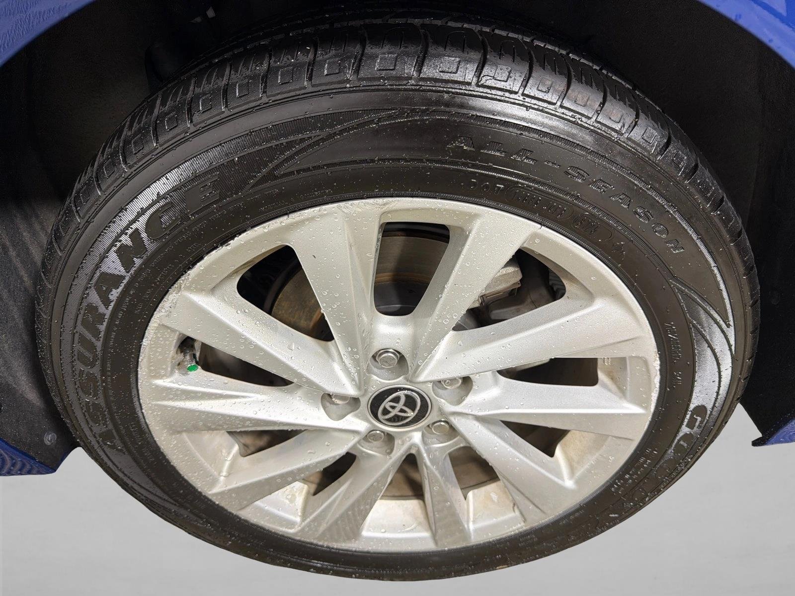 Used 2024 Reservoir Blue Toyota LE image 19
