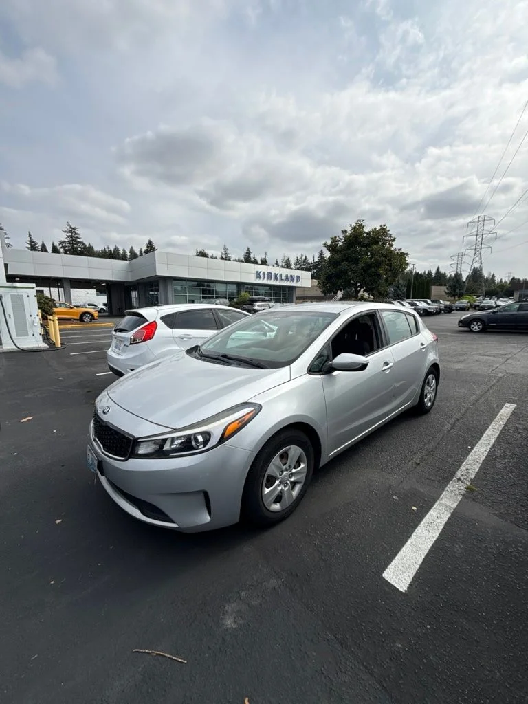 Used 2017 Silky Silver Kia LX image 1