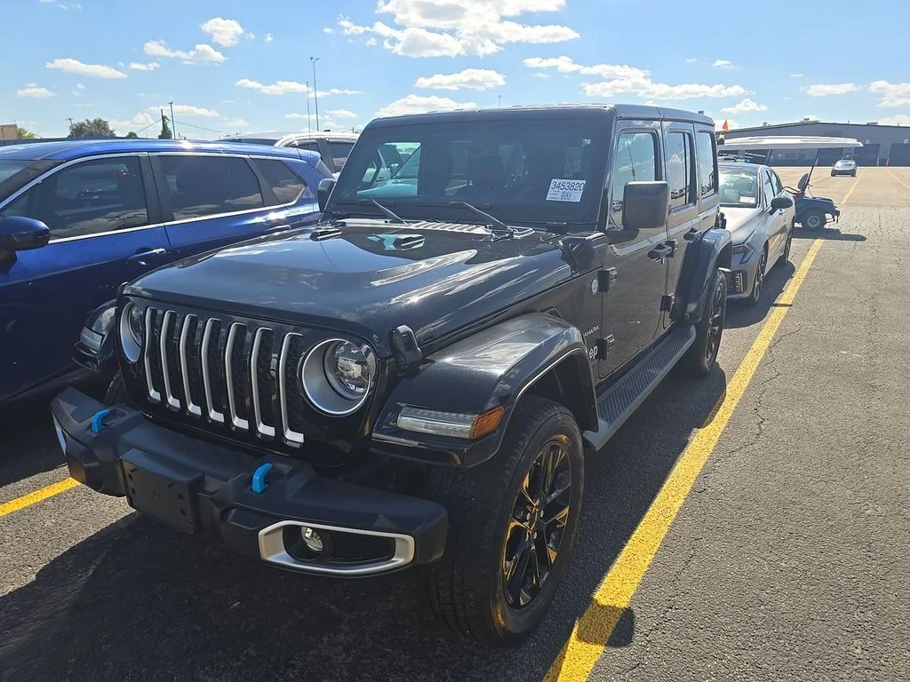 Used 2023 Black Jeep Sahara 4xe image 1