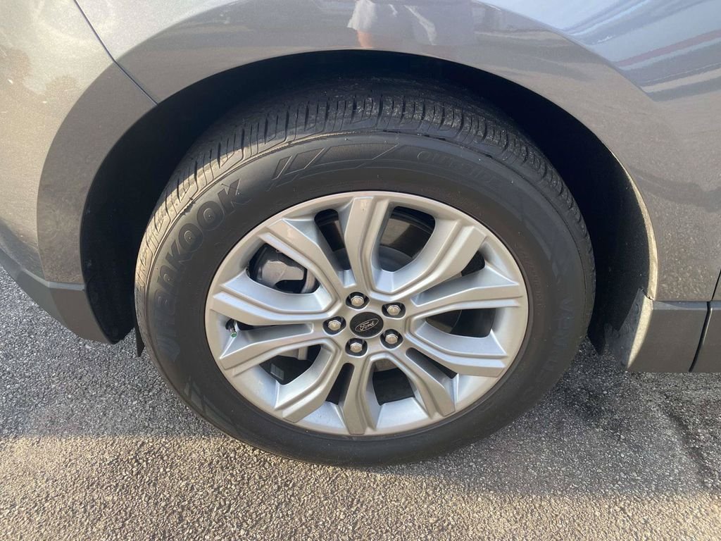 Used 2023 Carbonized Gray Metallic Ford Titanium image 4