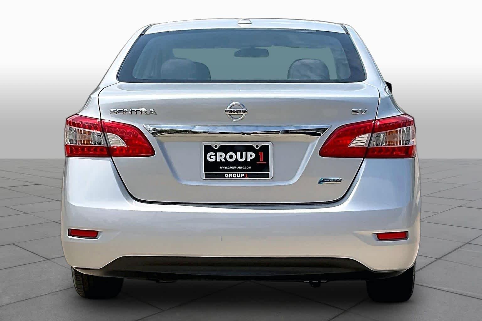 Used 2014 Brilliant Silver Nissan SV image 5