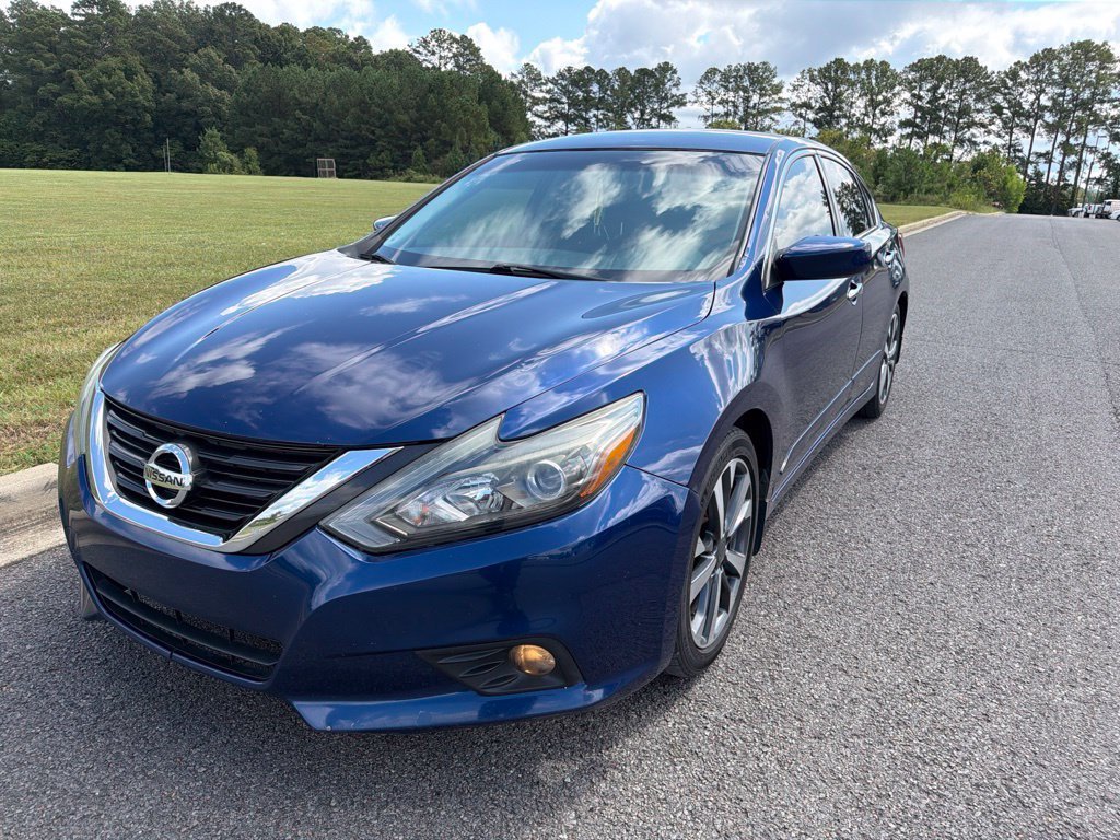 Used 2017 Deep Blue Pearl Nissan 2.5 SR image 1