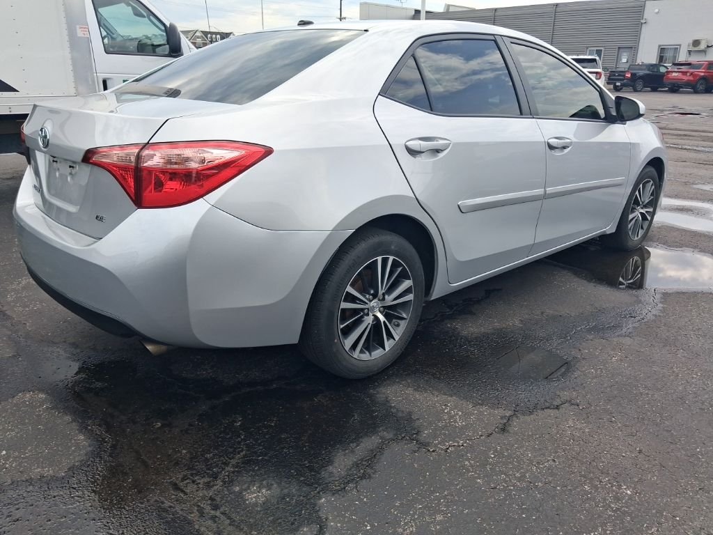 Used 2019 Classic Silver Metallic Toyota LE image 4