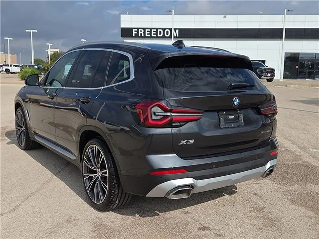 Used 2023 Black Sapphire Metallic BMW sDrive30i 4x2 Sports Activity Vehicle image 2