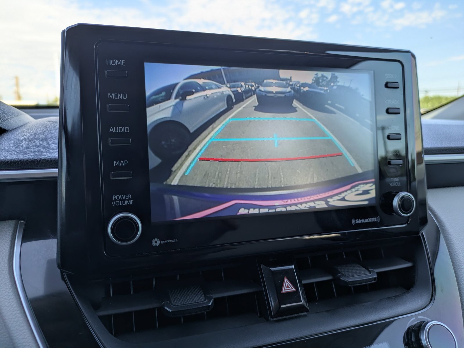 Used 2022 Blue Crush Metallic Toyota LE image 13