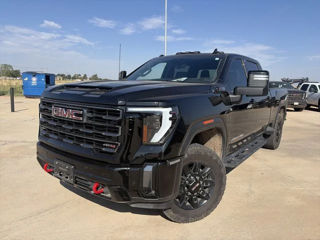 Used 2024 Black GMC AT4 image 1