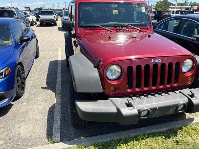Used 2013 Deep Cherry Red Crystal Jeep Sport image 4