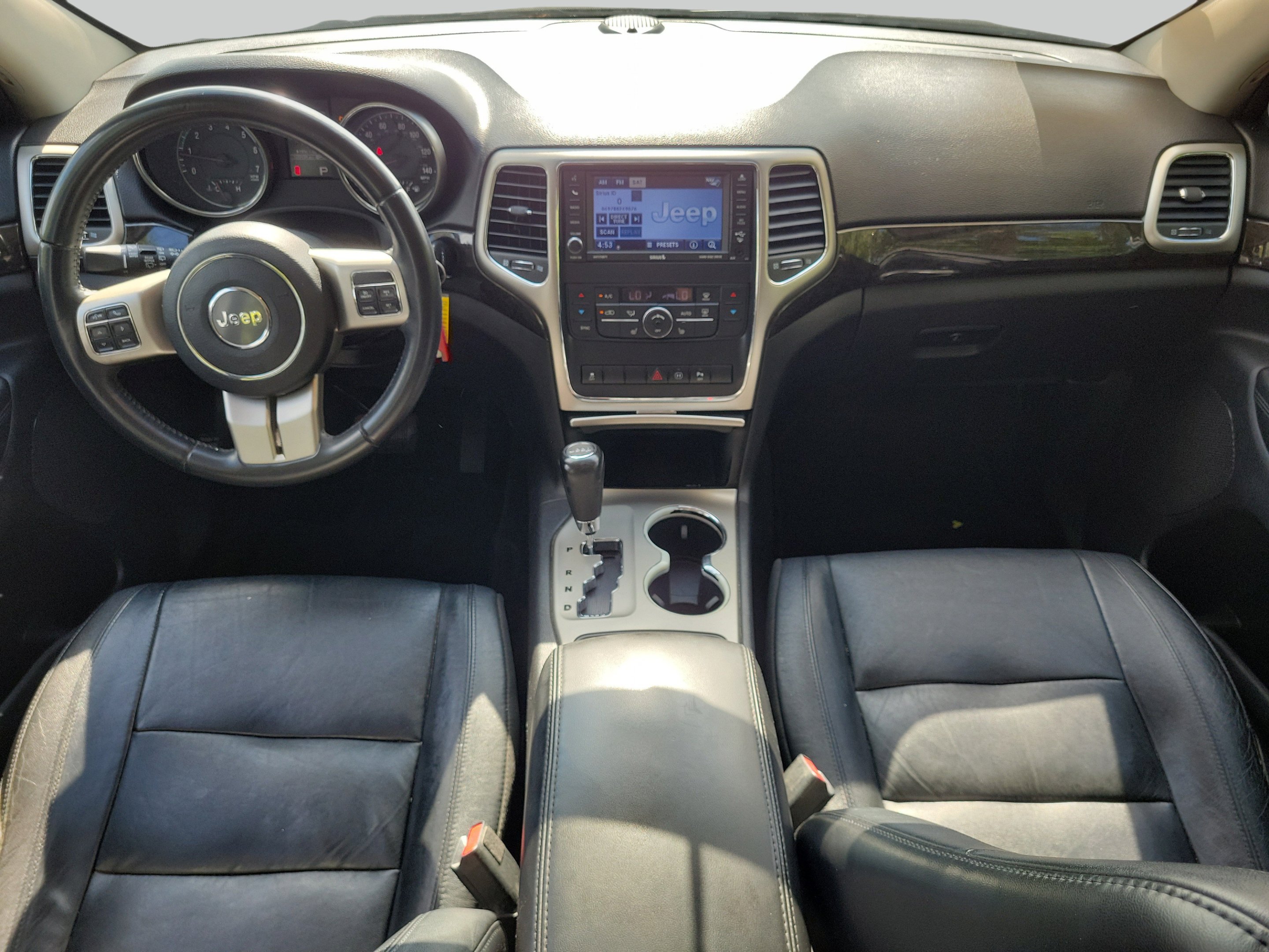 Used 2012 Mineral Gray Metallic Clearcoat Jeep Laredo image 14