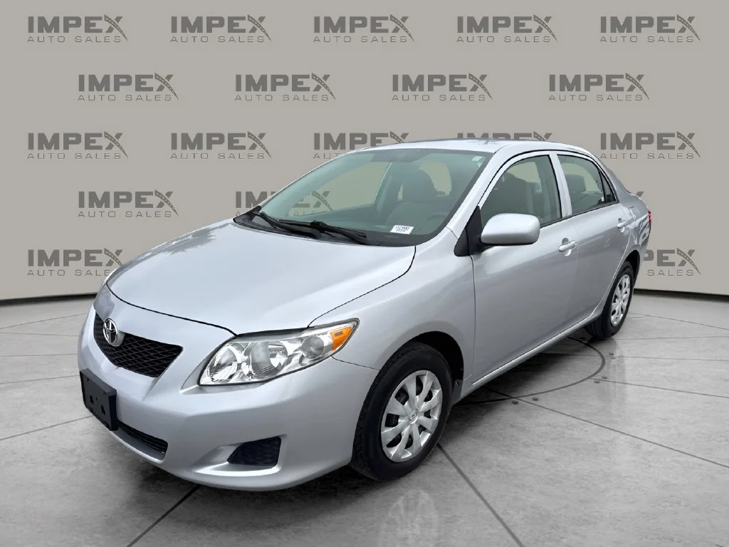 Used 2010 Silver Toyota LE image 1