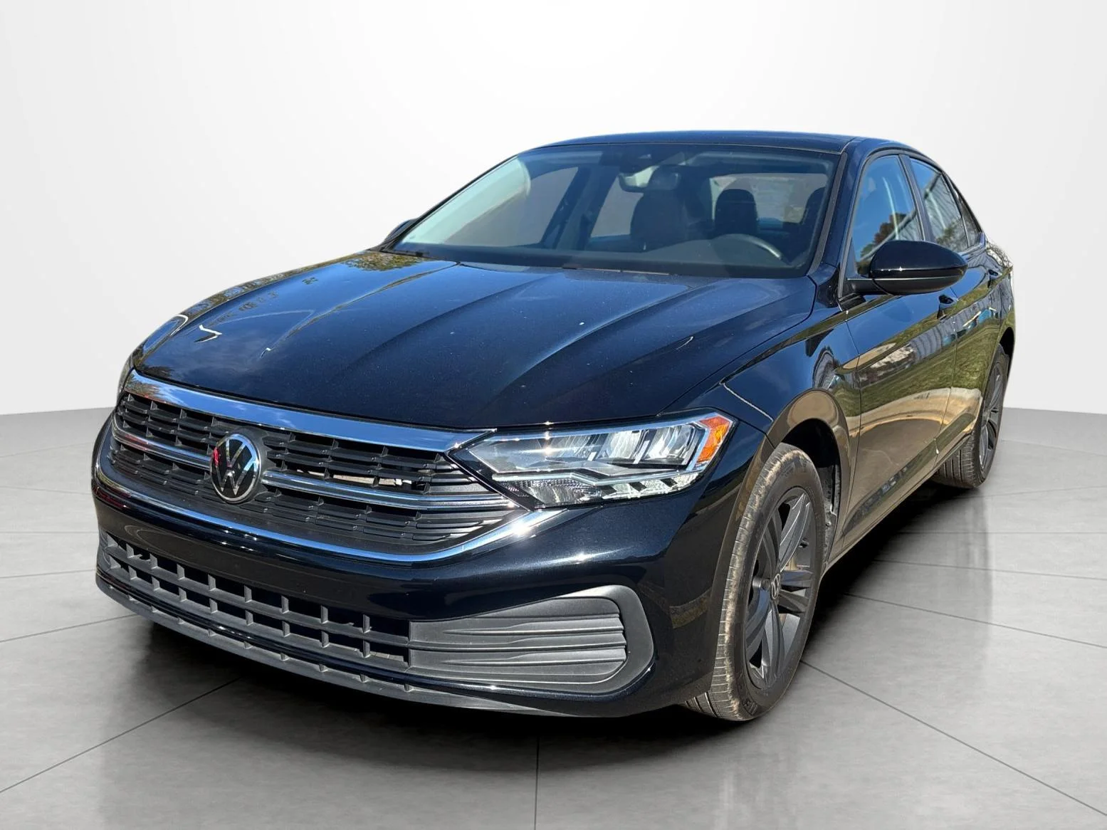 Used 2023 DEEP BLACK VOLKSWAGEN SE image 1