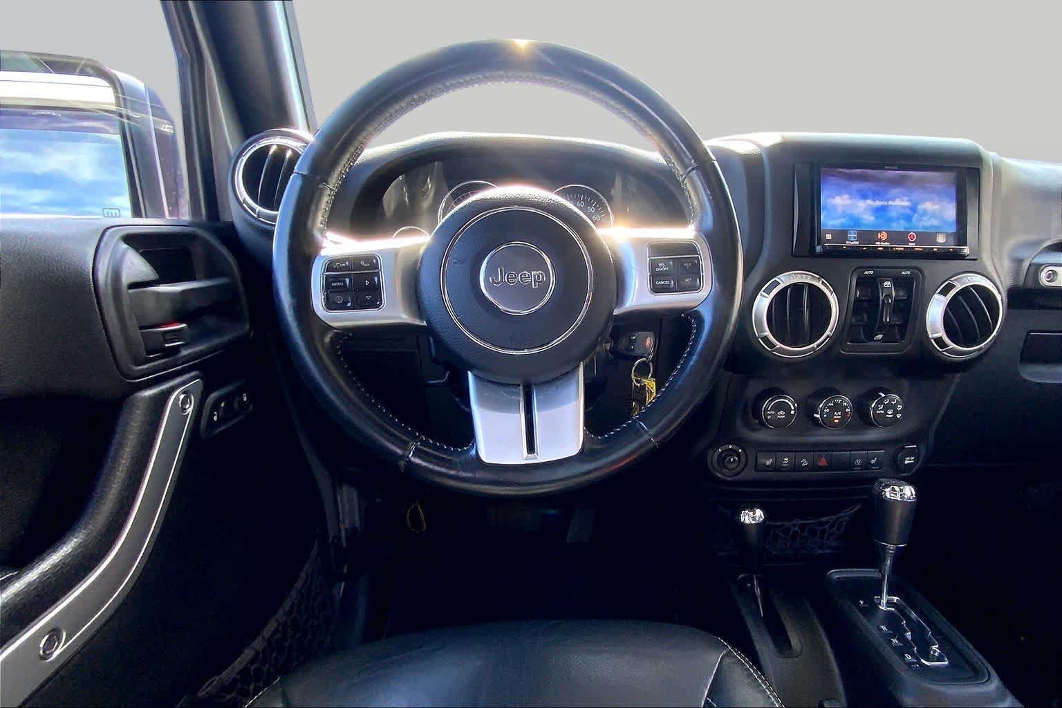 Used 2015 Billet Silver Metallic Clearcoat Jeep Rubicon Hard Rock image 5
