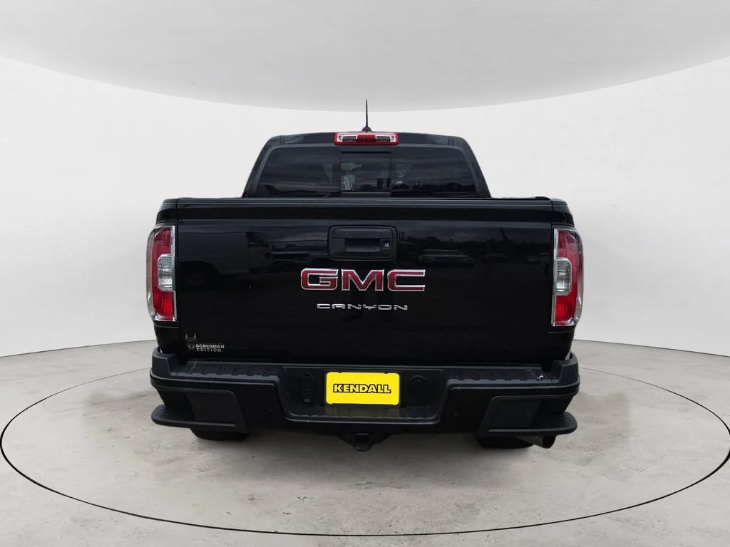 Used 2021 ONYX BLACK GMC 4WD Elevation image 10