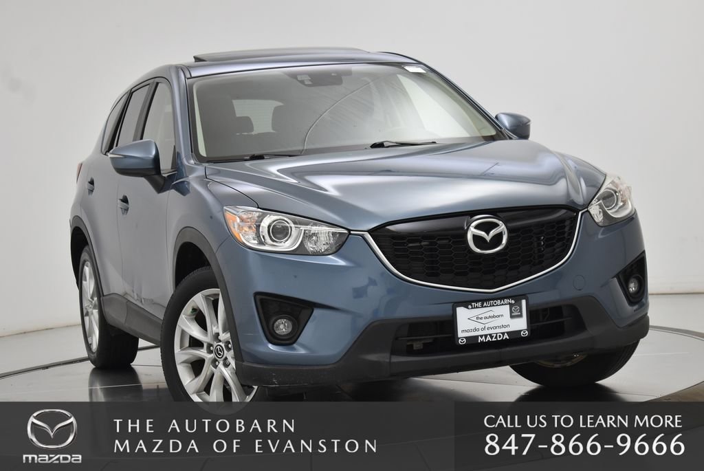 Used 2015 Blue Reflex Mica Mazda Grand Touring image 1