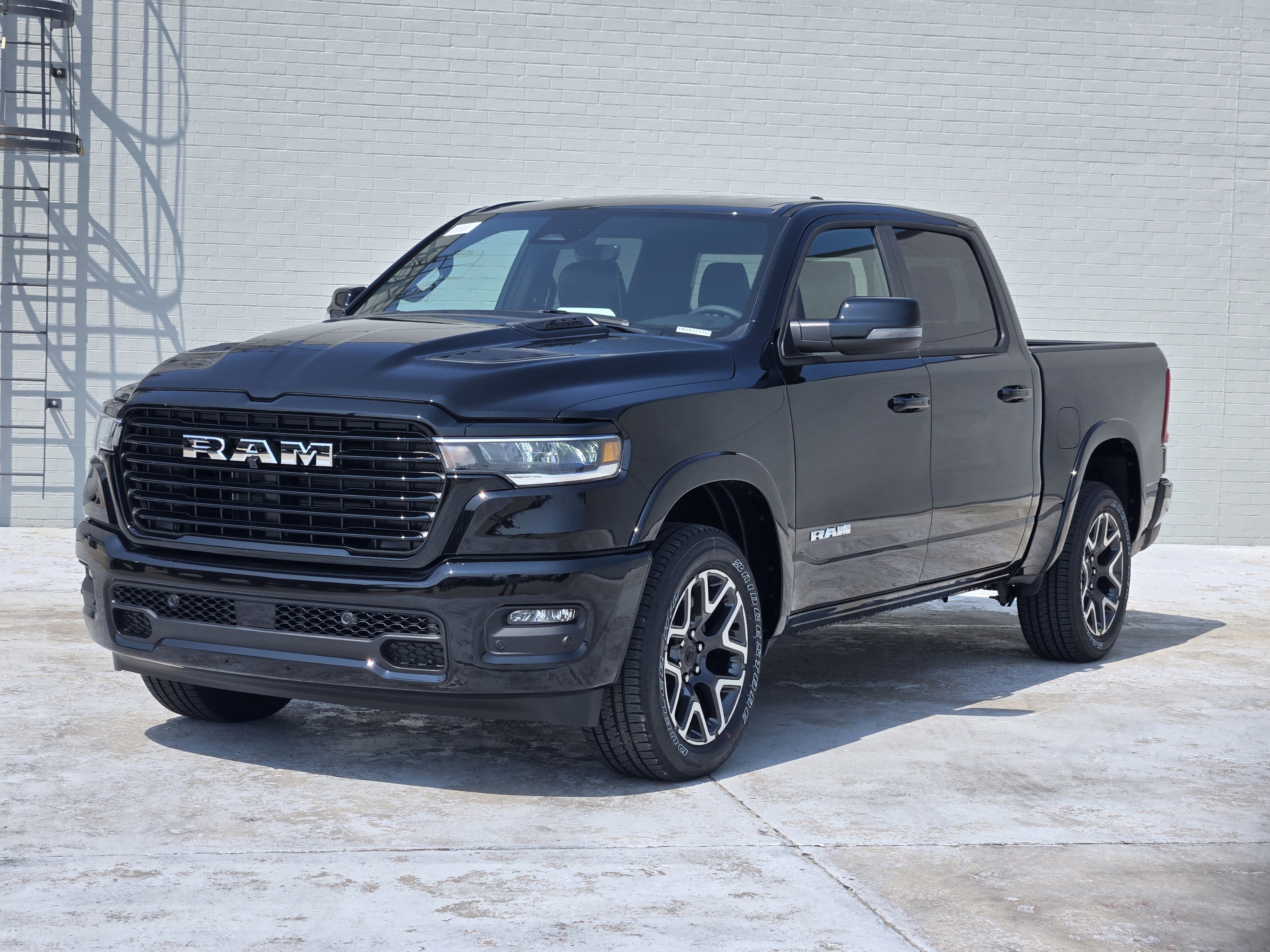 New 2026 Diamond Black Crystal Pearl-Coat Exterior Paint RAM Laramie image 2
