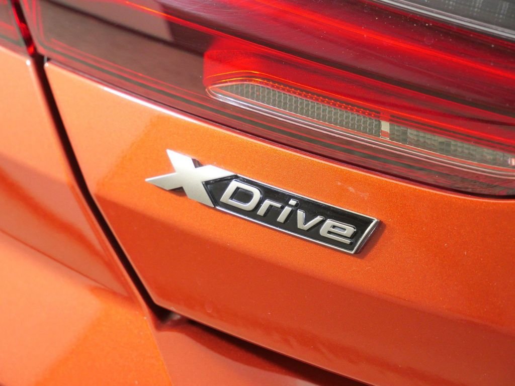 Used 2019 Sunset Orange Metallic BMW M850i xDrive image 14