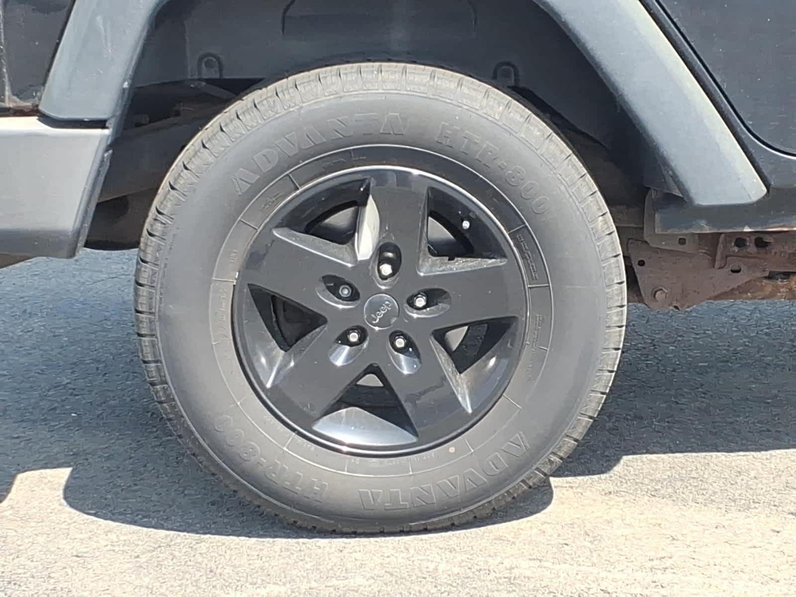 Used 2013 Black Clearcoat Jeep Sport image 4