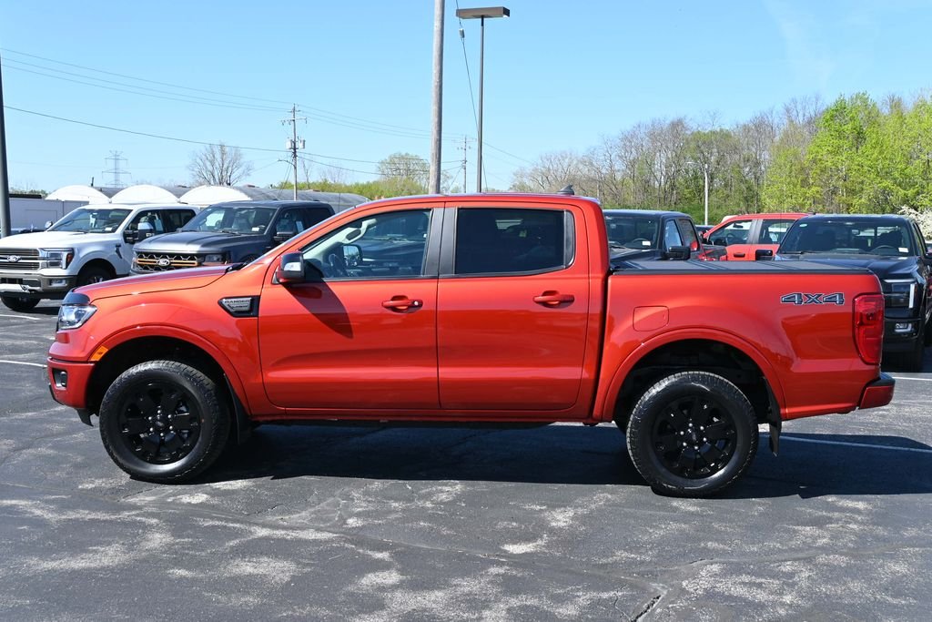 Certified Used 2023 Hot Pepper Red Metallic Tinted Clearcoat Ford Lariat image 4
