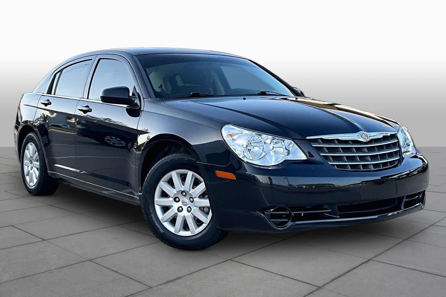 Used 2010 Brilliant Black Crystal Pearl Chrysler Touring image 2