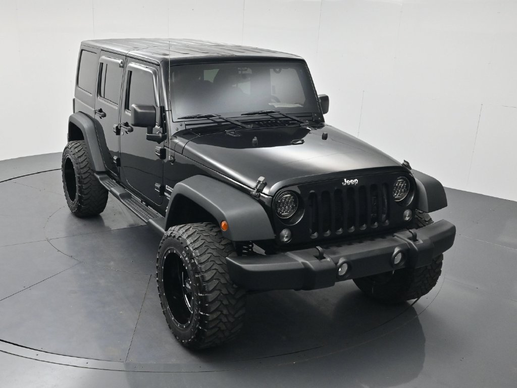 Used 2014 Black Clearcoat Jeep Unlimited Sport image 39