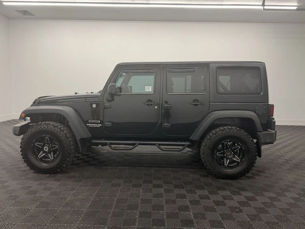 Used 2012 Black Jeep Sport image 2