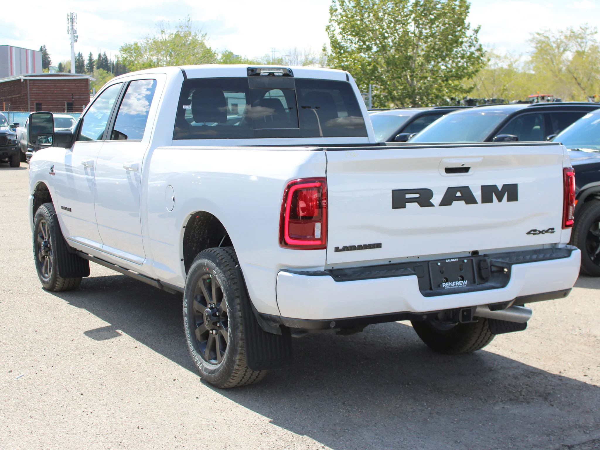 New 2026 White RAM Laramie* image 3