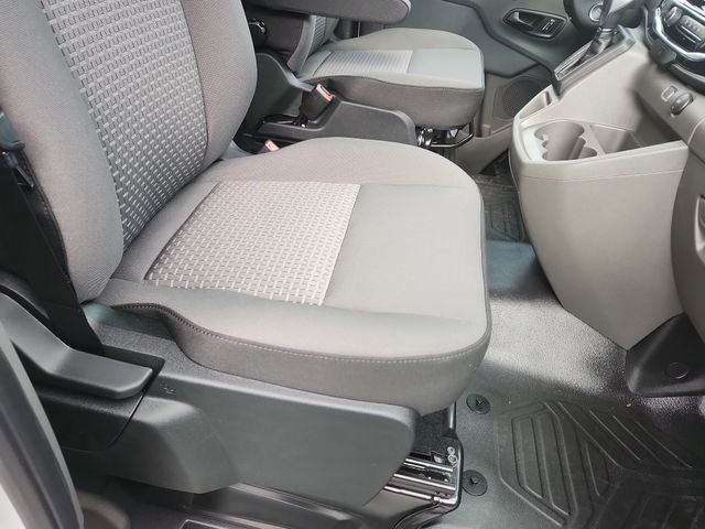 New 2026 Ingot Silver Metallic Ford Passenger Van XLT image 12