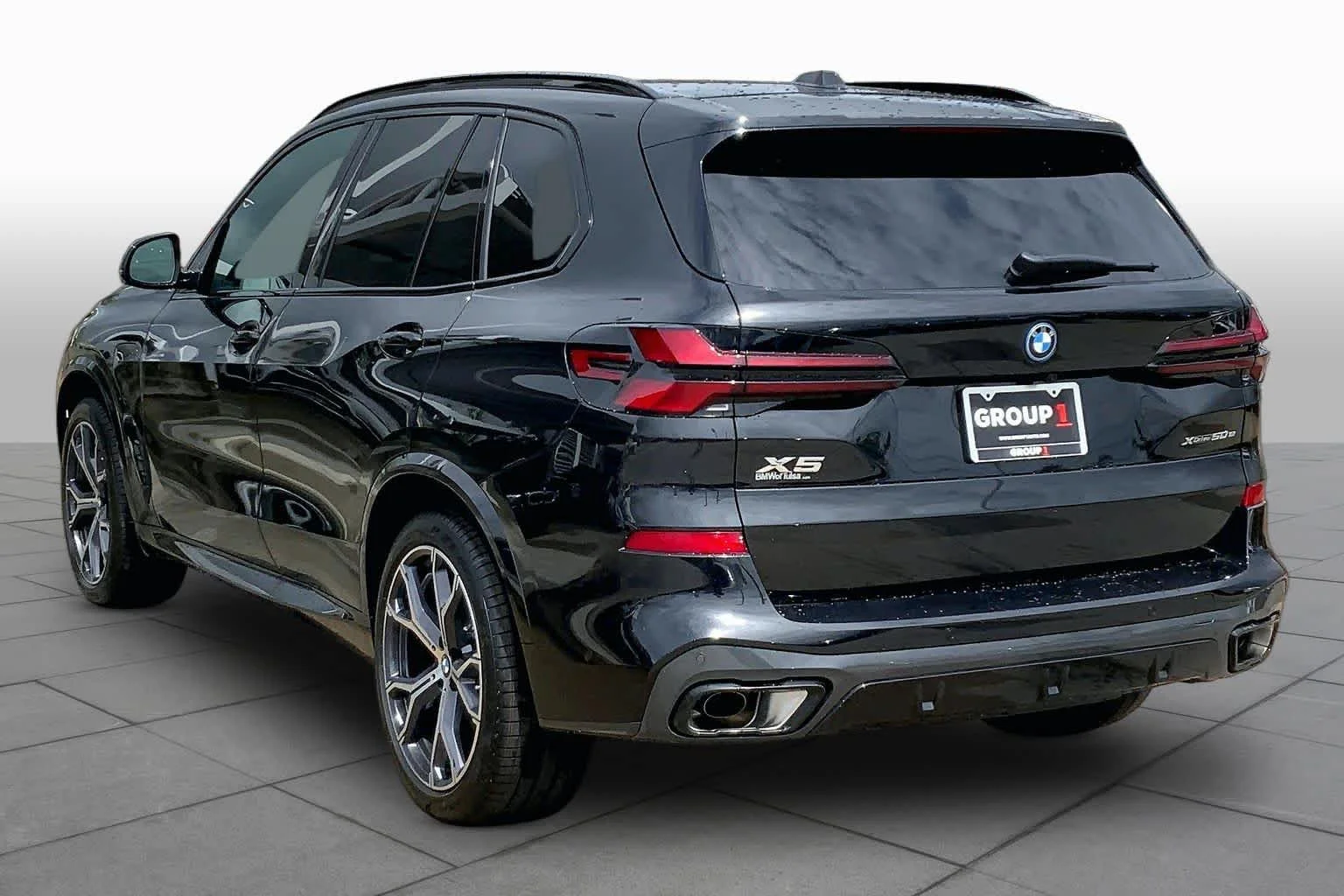 New 2026 Black Sapphire Metallic BMW xDrive50e image 11