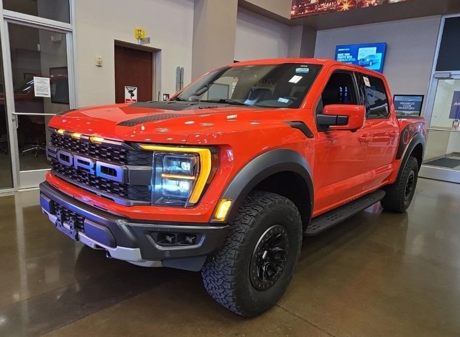 Used 2021 Orange Ford Raptor image 1