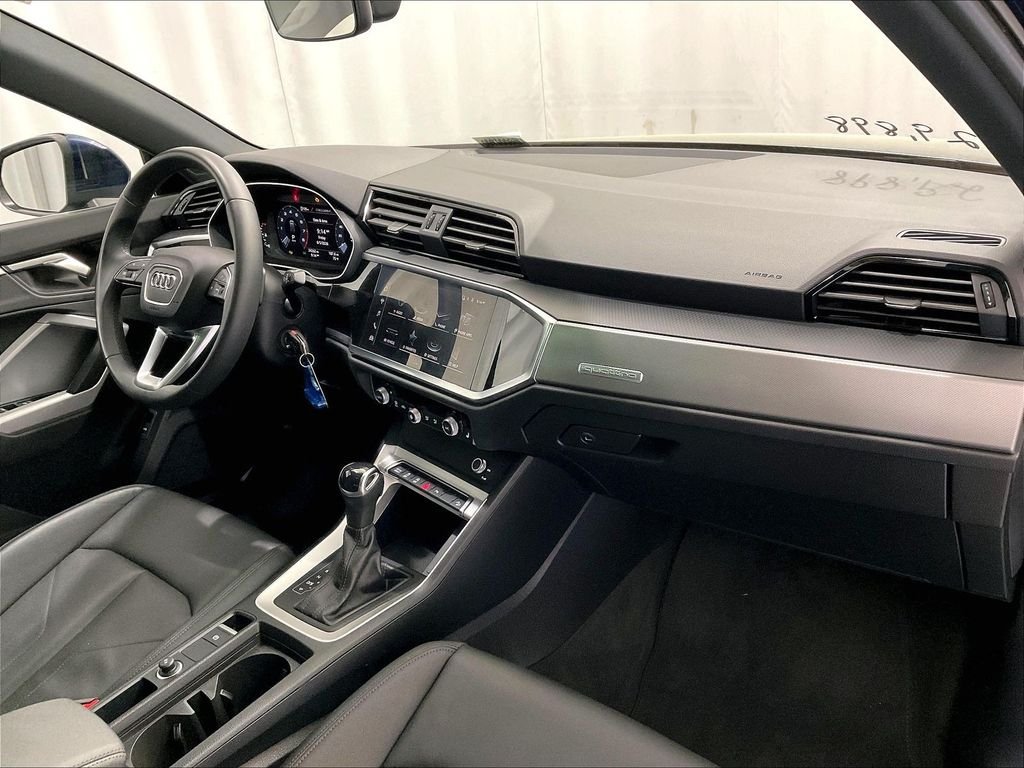 Used 2025 Navarra Blue Metallic Audi Premium image 14