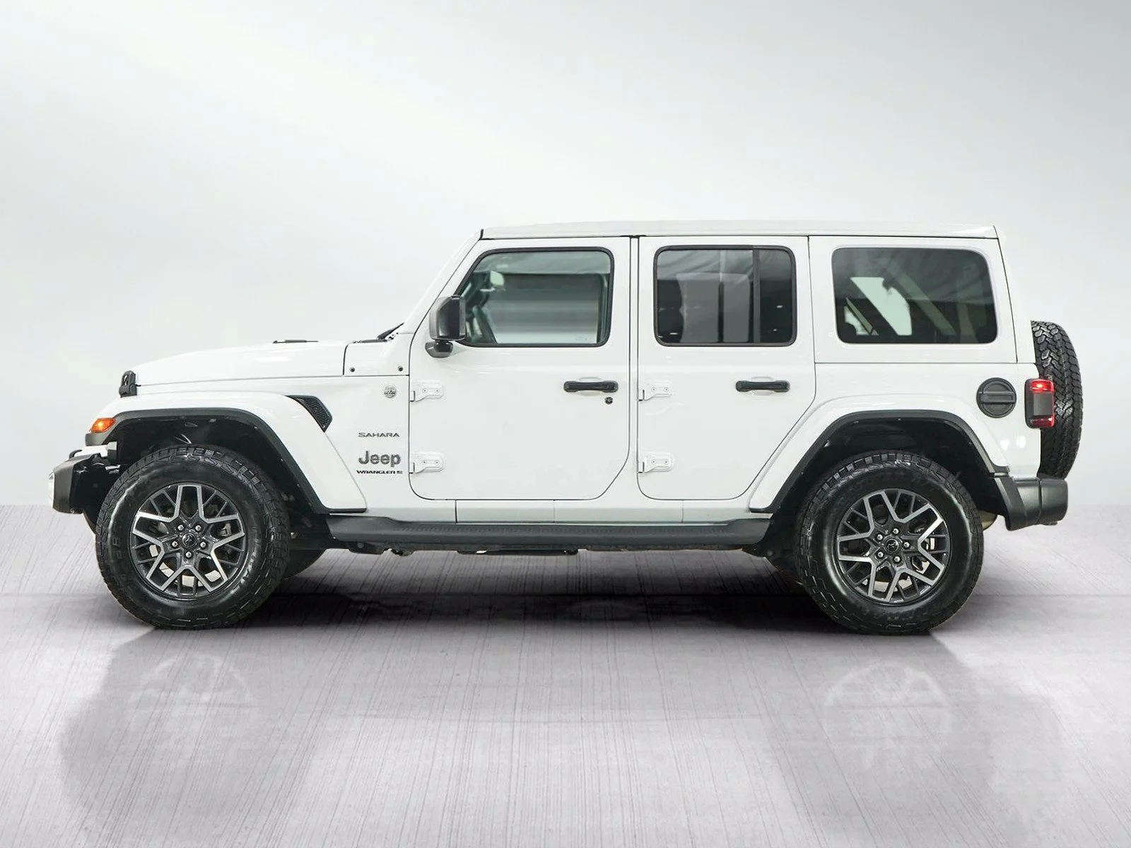 Used 2024 Jeep Wrangler 4-Door Sahara with VIN 1C4PJXEG6RW247155 for sale in Hopkins, Minnesota