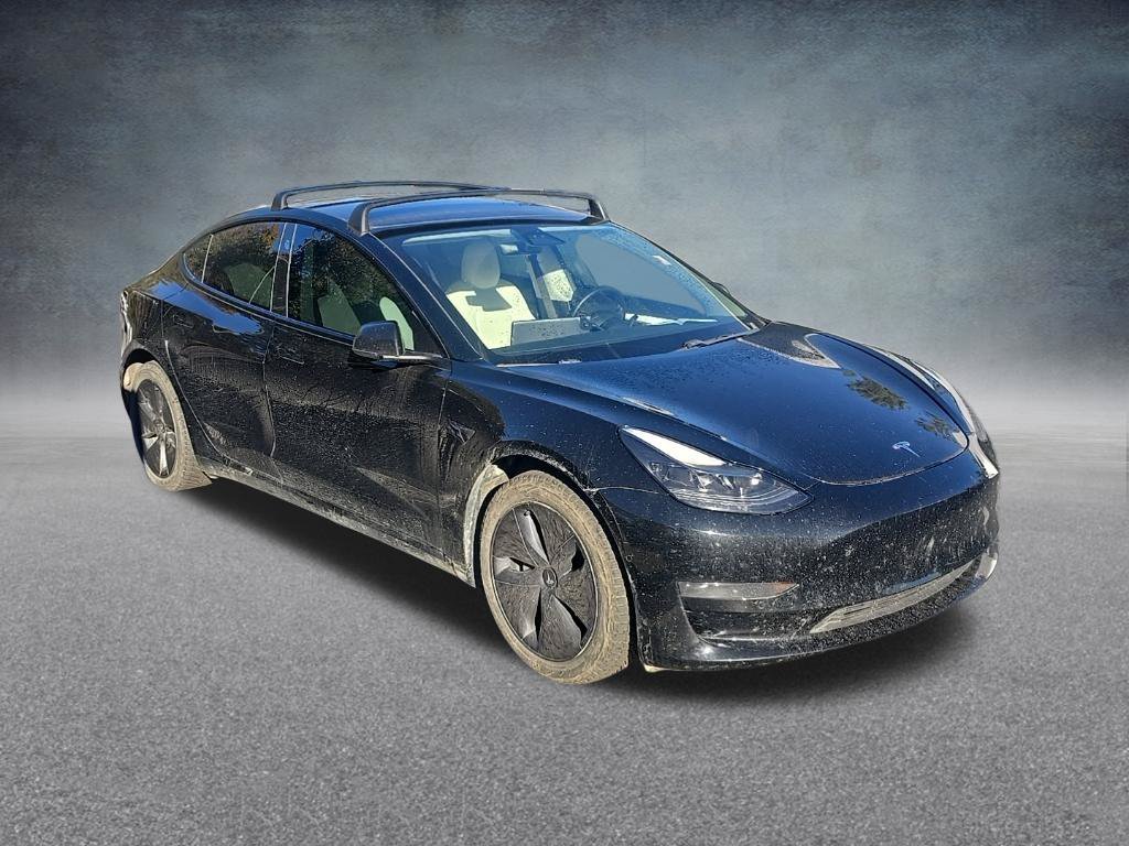 Used 2021 Solid Black Tesla Standard Range Plus image 8