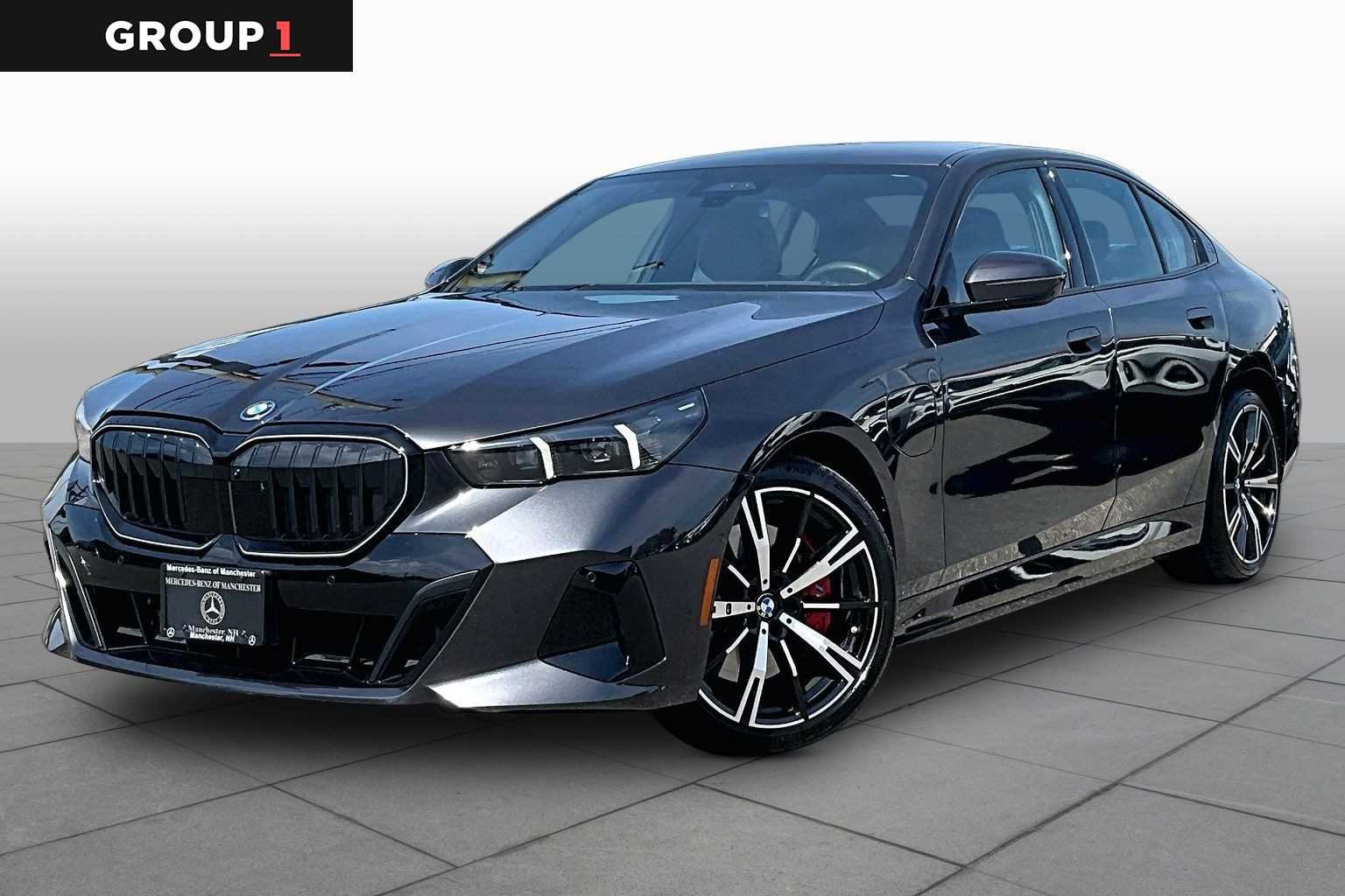 2026 BMW 5 Series 550e xDrive Sedan's photo