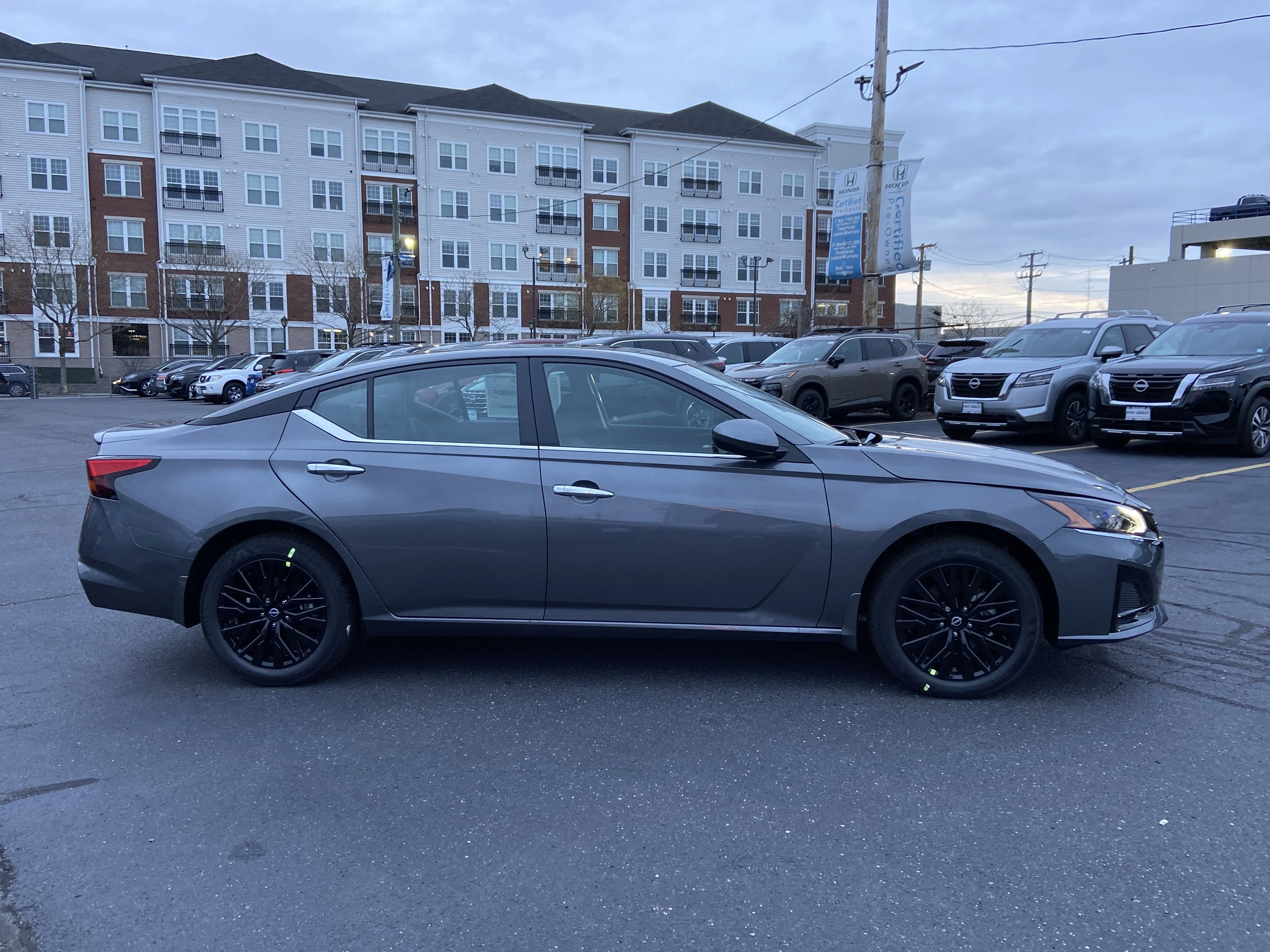 New 2025 Gun Metallic Nissan SV image 3