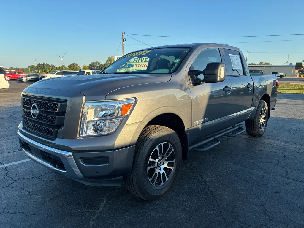 Used 2024 Gun Metallic Nissan SV image 1