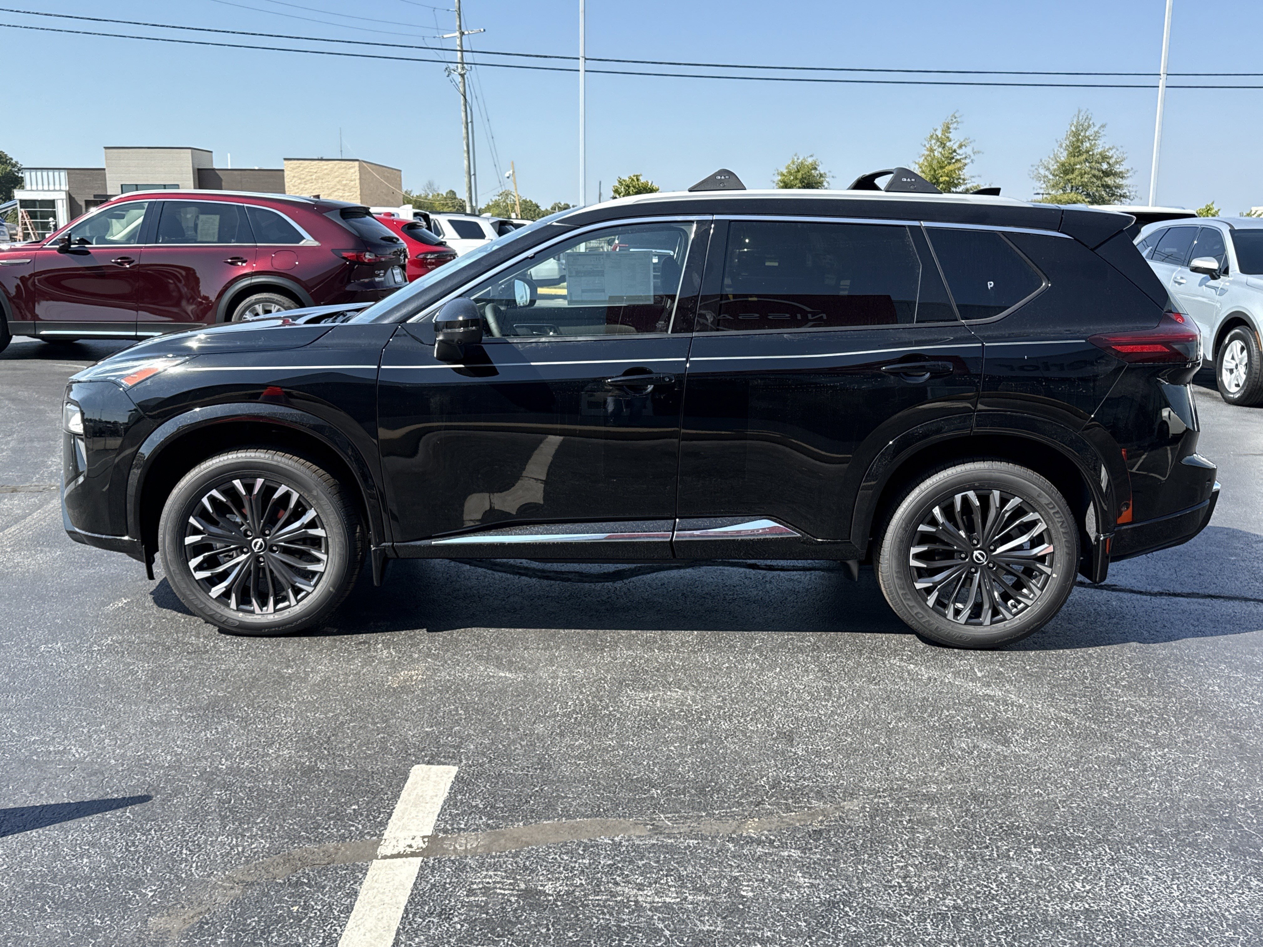 New 2026 Super Black Nissan Platinum image 11