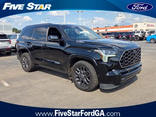 Used 2024 Black Toyota Platinum image 1