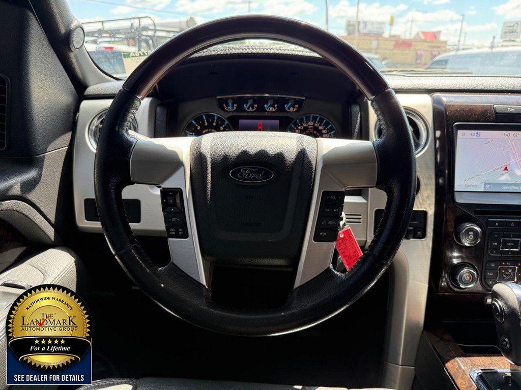 Used 2013 White Platinum Metallic Tri-Coat Ford 4WD SuperCrew 145" Platinum image 18