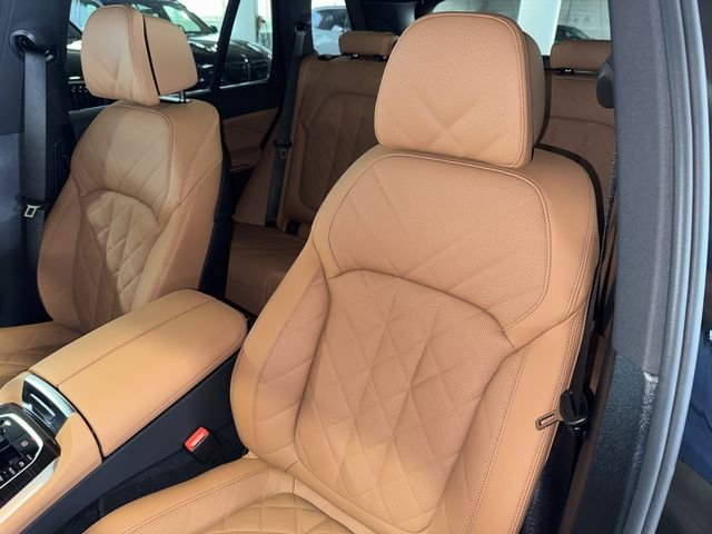 New 2026 Black Sapphire Metallic BMW xDrive50e image 24