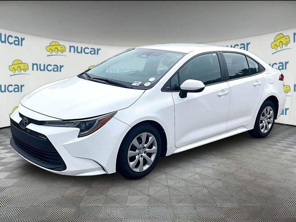 Used 2023 White Toyota LE image 3