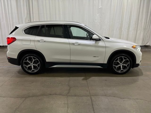 Used 2018 BMW X1 28i with VIN WBXHT3C32J5K29501 for sale in Grants Pass, OR