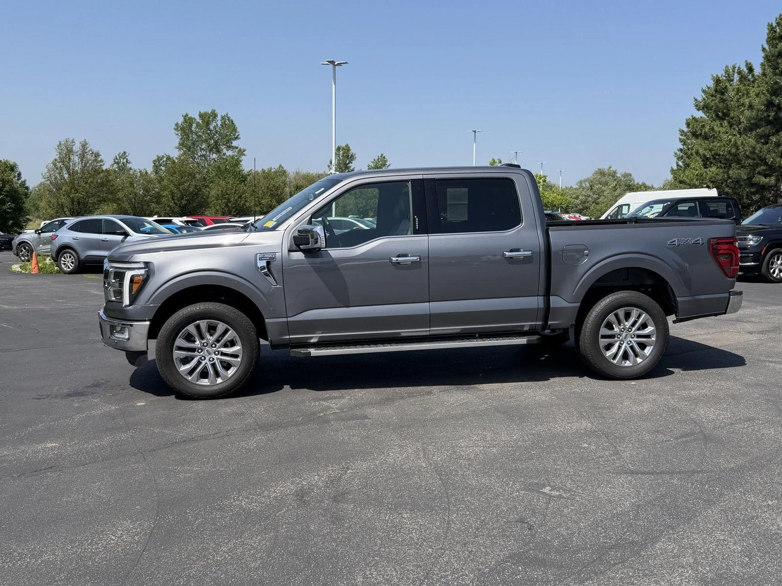 Used 2024 Carbonized Gray Ford LARIAT image 4