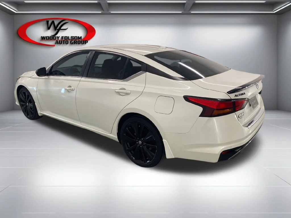 Used 2022 Pearl White Trico Nissan 2.5 SR image 8