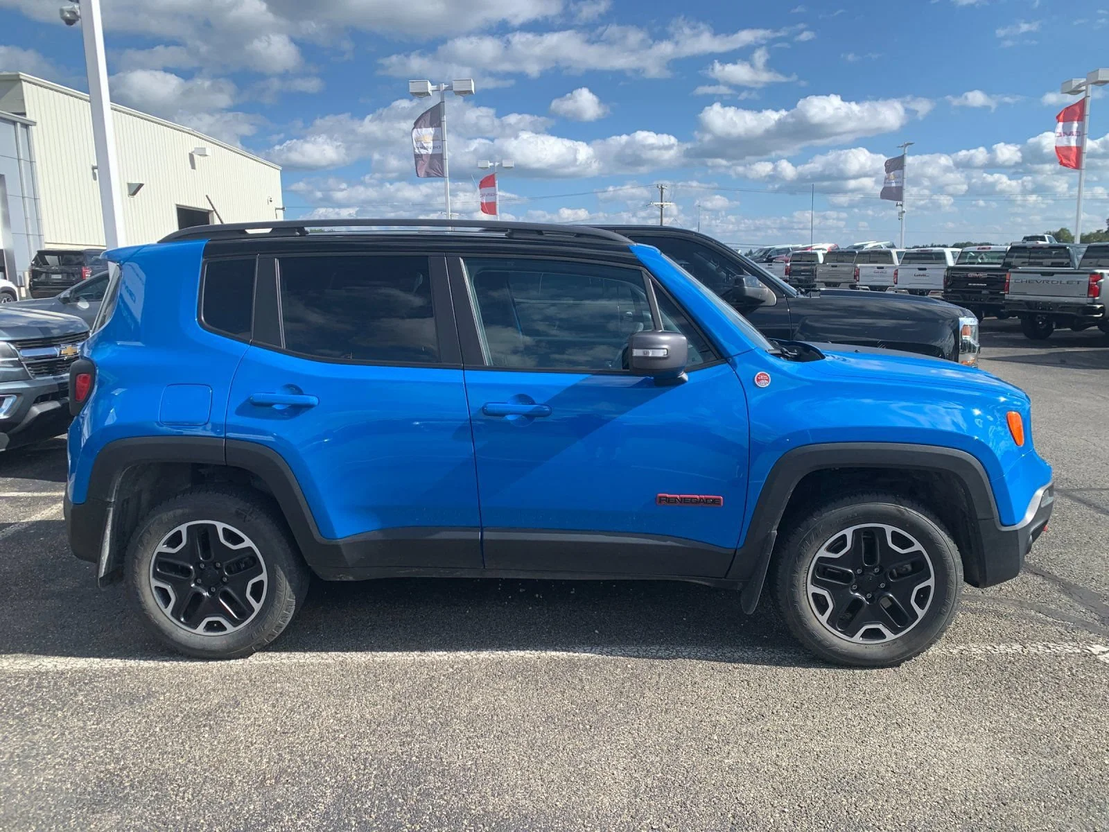 Used 2015 Sierra Blue Jeep Trailhawk image 2