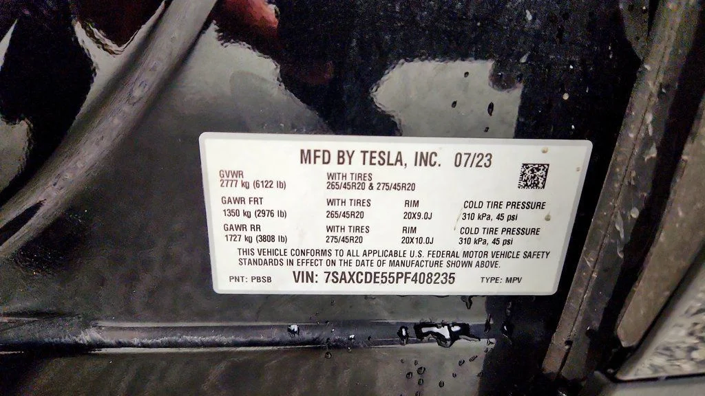 Used 2023 Solid Black Tesla AWD image 25