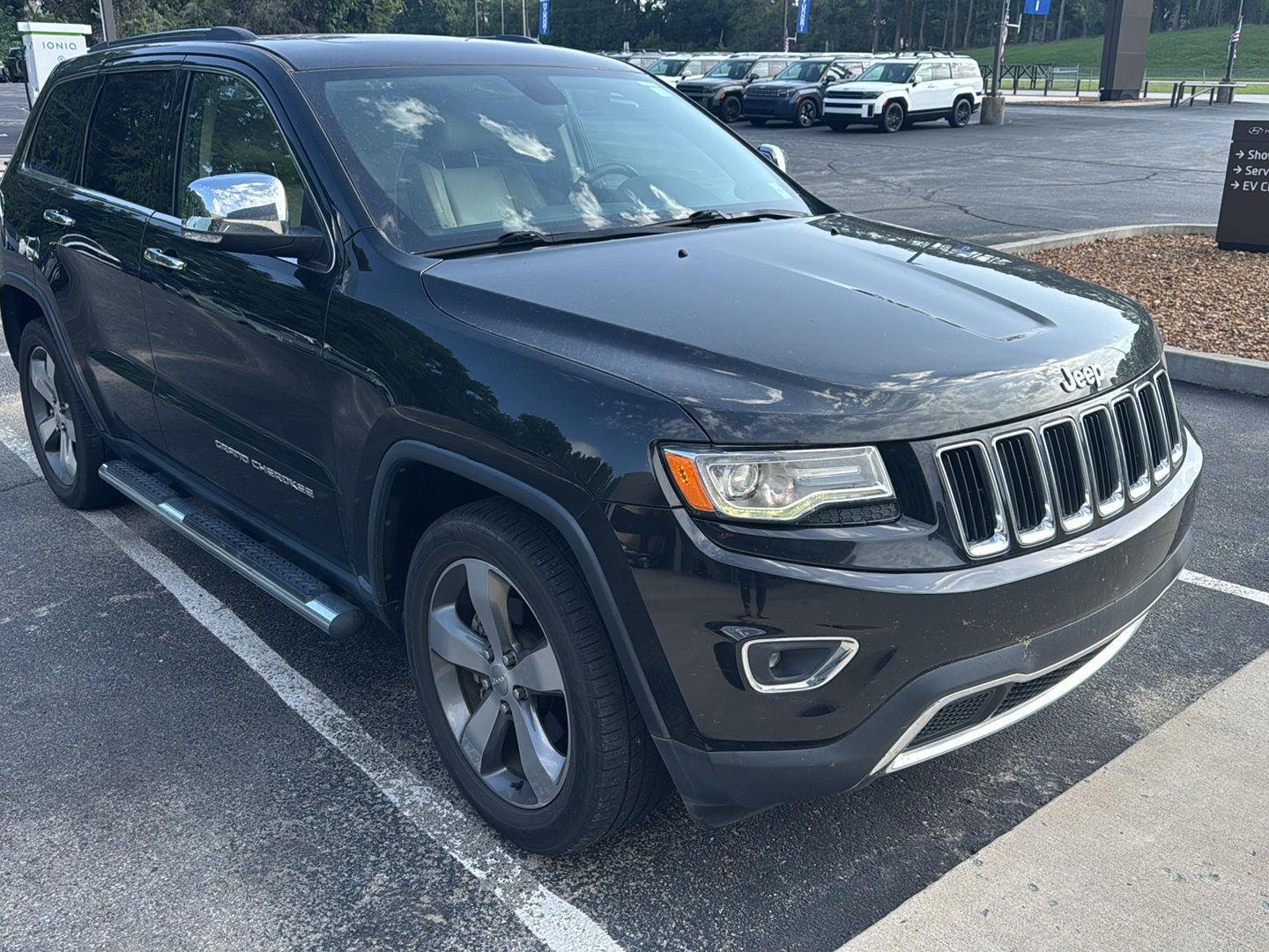 Used 2015 Brilliant Black Crystal Pearlcoat Jeep Limited image 1